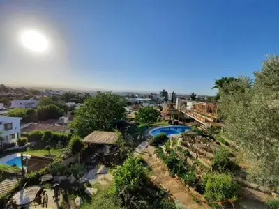 an aerial view of a resort with a swimming pool at El fogón de los amigos in Villa Carlos Paz