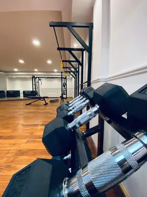 a gym with treadmills and machines in a room at Departamento 610 - Edificio VILAUT by INMOVE Temporarios in Cordoba