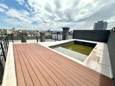 a rooftop deck with a hot tub on a building at Departamento p 4 personas F Gral Paz in Cordoba