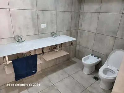 a bathroom with a sink and a toilet at plaza Colonn in Cordoba