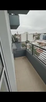 a balcony with a view of a city at Departamento in Cordoba