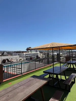a picnic table on the roof of a building at Depto Céntrico, Cochera, Pile, Terraza in Villa Carlos Paz