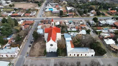 an aerial view of a small town with a church at Suite en el corazón de Nono in Nono