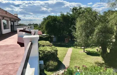 a view of a garden from a house at Hosteria de los Césares in Merlo
