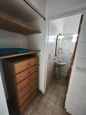 a small bathroom with a sink and a toilet at Dpto Villa Carlos Paz max 5 personas in Villa Carlos Paz
