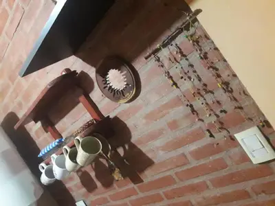 an overhead view of a room with a brick wall at Casa Sol y Rio in Mina Clavero
