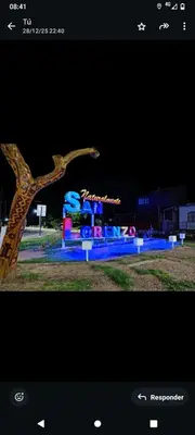 a picture of a statue in a park at night at El Crespín in San Lorenzo