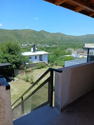 a view from the balcony of a house at La soñada in San Antonio de Arredondo