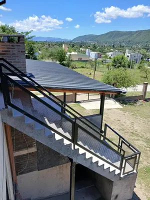 a view from the balcony of a house with a roof at La Soñada in Villa Independencia