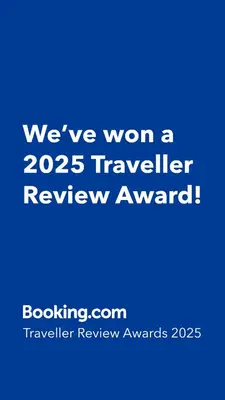 a blue sign that says weve won a traveler review award at Rocio de Luna in Mina Clavero