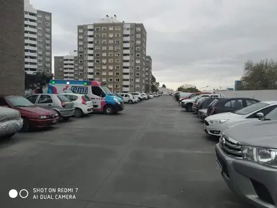 a parking lot filled with lots of parked cars at Villasol Temporario in Cordoba