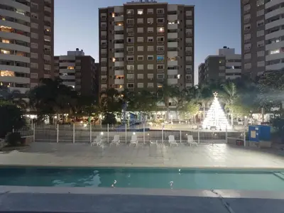 a fountain in the middle of a city with tall buildings at Villasol Temporario in Cordoba