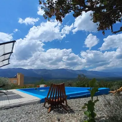 a villa with a view of the mountains at cabañas fátima in Villa de Las Rosas