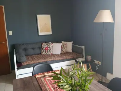 a living room with a couch and a table at NUEVOCENTRO 1 in Cordoba